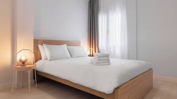 Desk, laptop workspace, blackout curtains, iron/ironing board