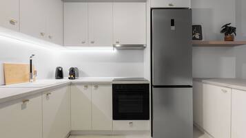 公寓, 3 間臥室, 露台, 城市景 | 私人廚房 | 大型雪櫃/冰箱、焗爐、爐具、洗碗機