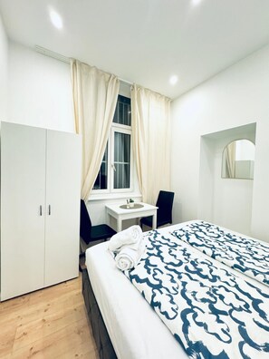 Apartamento básico | Tabla de planchar con plancha