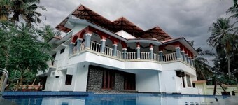 Ocean Queen Palace Poovar – Deluxe Double Room with Stunning Sea View