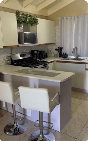 Fridge, microwave, oven, stovetop - Island Living 2Bedroom  Bungalow in Montego Bay with AC, Hot Water & WiFi (Montego Bay)