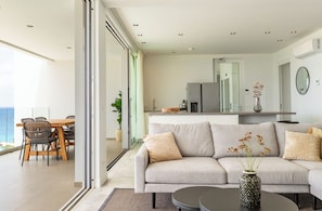 Deluxe Apartment, 2 Bedrooms, Balcony, Sea View | Living area | 80-cm Smart TV with digital channels, Netflix, streaming services - Mambo Beach Holiday Apartments (Willemstad)