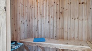 A sauna with wooden walls and a bench. - VillaVilla 314 - Marielyst, Lolland/Falster/møn (Væggerløse)