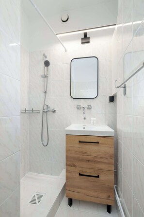 Dutxa, assecador de cabells i tovalloles 