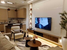 Luxury Apartment, 2 Bedrooms, Non Smoking, Microwave | Living area | 45-inch LED TV with cable channels, Netflix, first-run movies