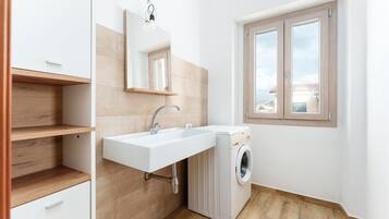 Shower, free toiletries, hair dryer, towels