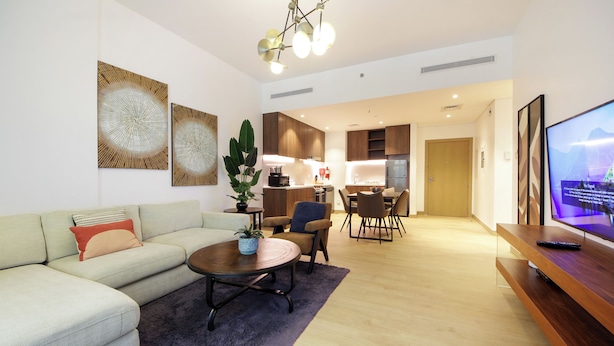Apartment, City View | Living area | 64-inch LED TV with digital channels