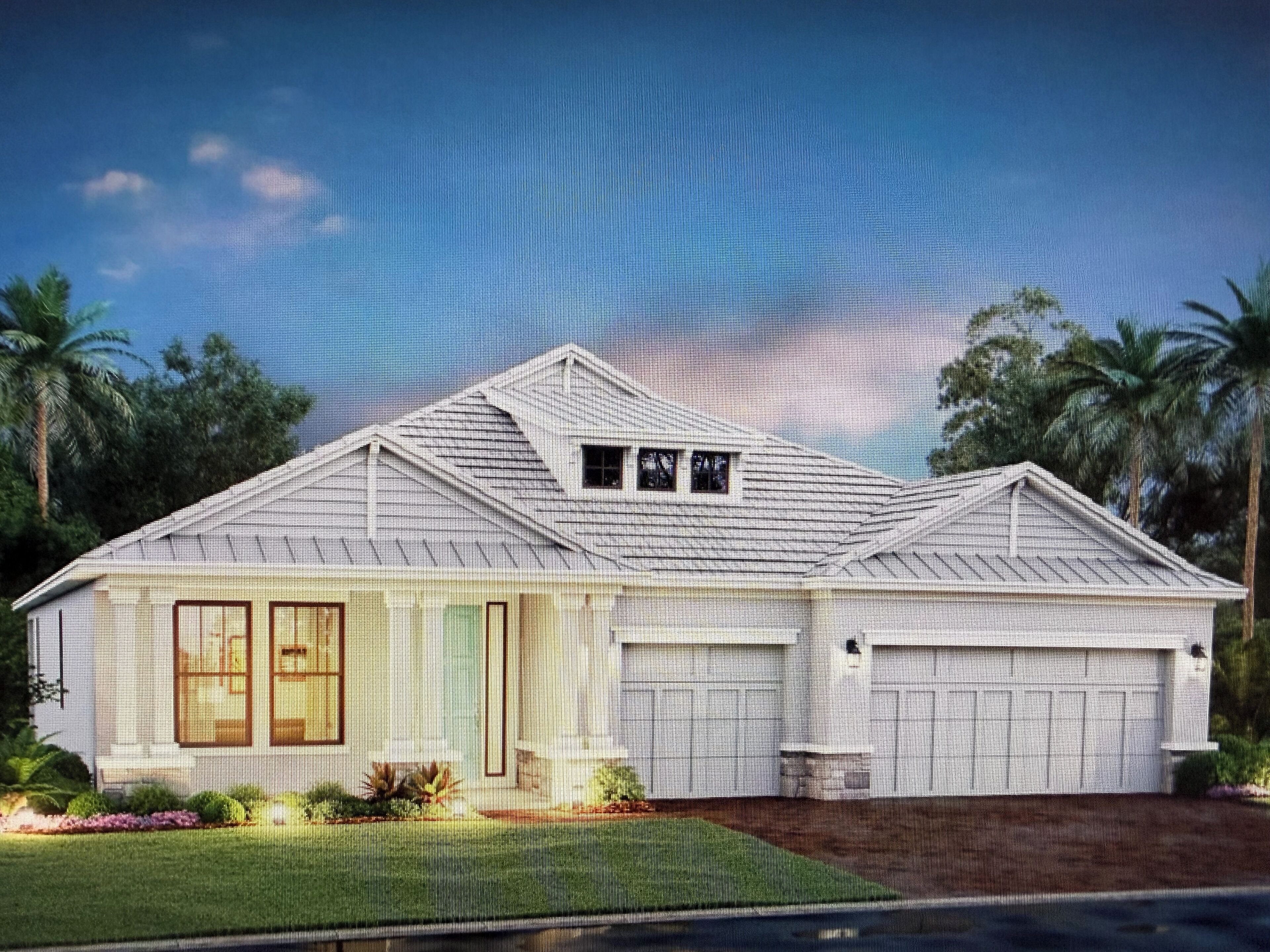 A single-story house with a gabled roof, a garage, and a front yard with palm trees and shrubs.