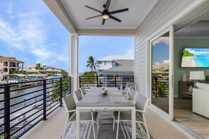 House, Multiple Bedrooms | Outdoor dining - 261/265 Canal Estates: 12br, Pools & Spas, Water Views 11 Bedroom Home (Fort Myers Beach)