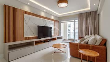 Comfort Apartment | Living area | Flat-screen TV