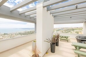 Apartamento | Restaurante al aire libre