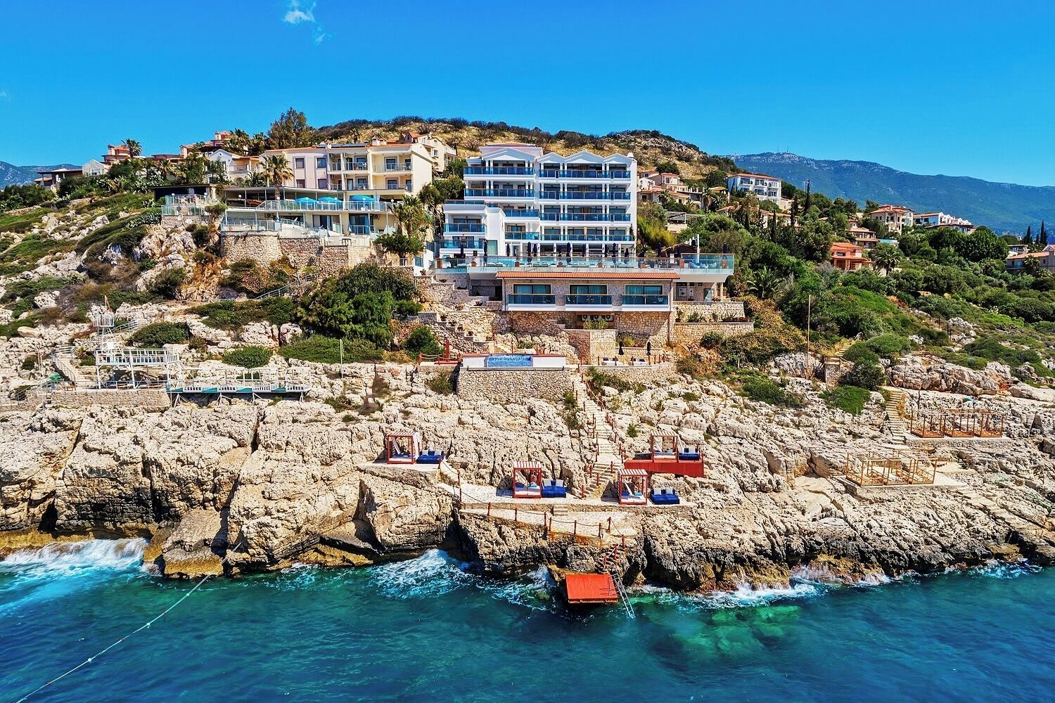 Private beach, free beach shuttle, sun loungers, beach umbrellas