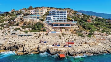 Private beach, free beach shuttle, sun loungers, beach umbrellas