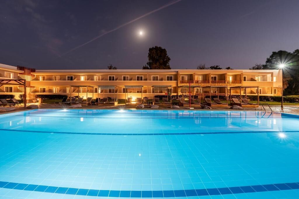 Seasonal outdoor pool, pool umbrellas, pool loungers