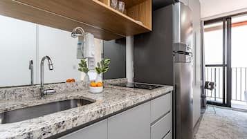 Fridge, microwave, stovetop, cookware/dishes/utensils