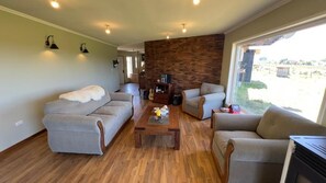 Familie huis, uitzicht op tuin | Woonruimte