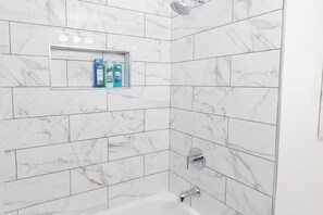 Hair dryer, towels, soap, shampoo