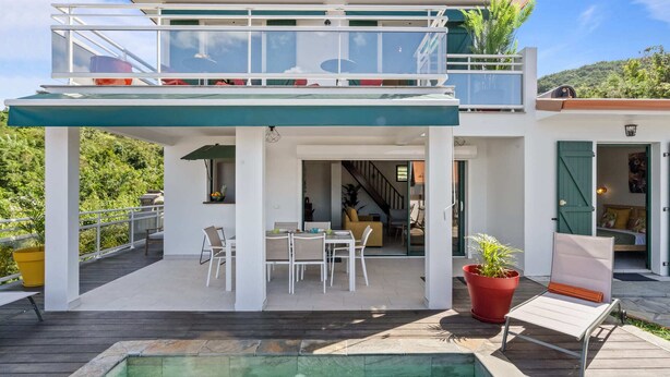 A two-story house with a balcony and a swimming pool. - Villa Arlet - Three Bedroom Villa, Sleeps 6 (Les Anses-d'Arlet)