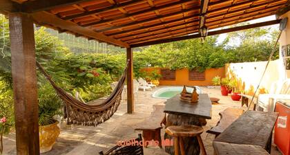 Suíte em Pousada em Rio Grande com Piscina e Vista