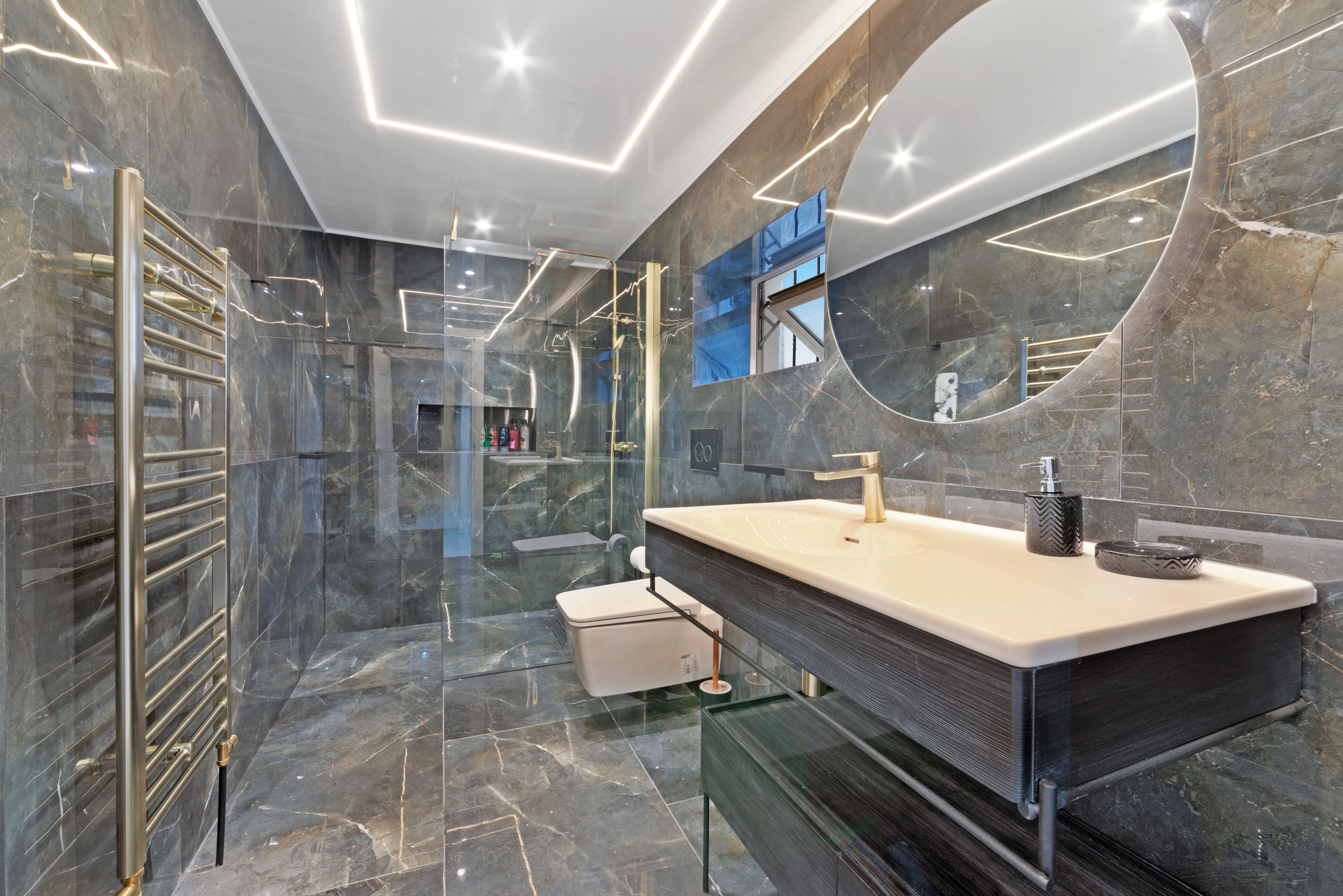 Shower, hair dryer, towels, toilet paper