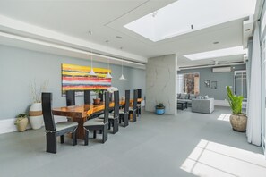 Deluxe Villa, 4 Bedrooms, Private Pool, Pool View | Living room | 50-inch Smart TV with cable channels, Netflix, books - Xxtra Villa Seminyak (Seminyak)