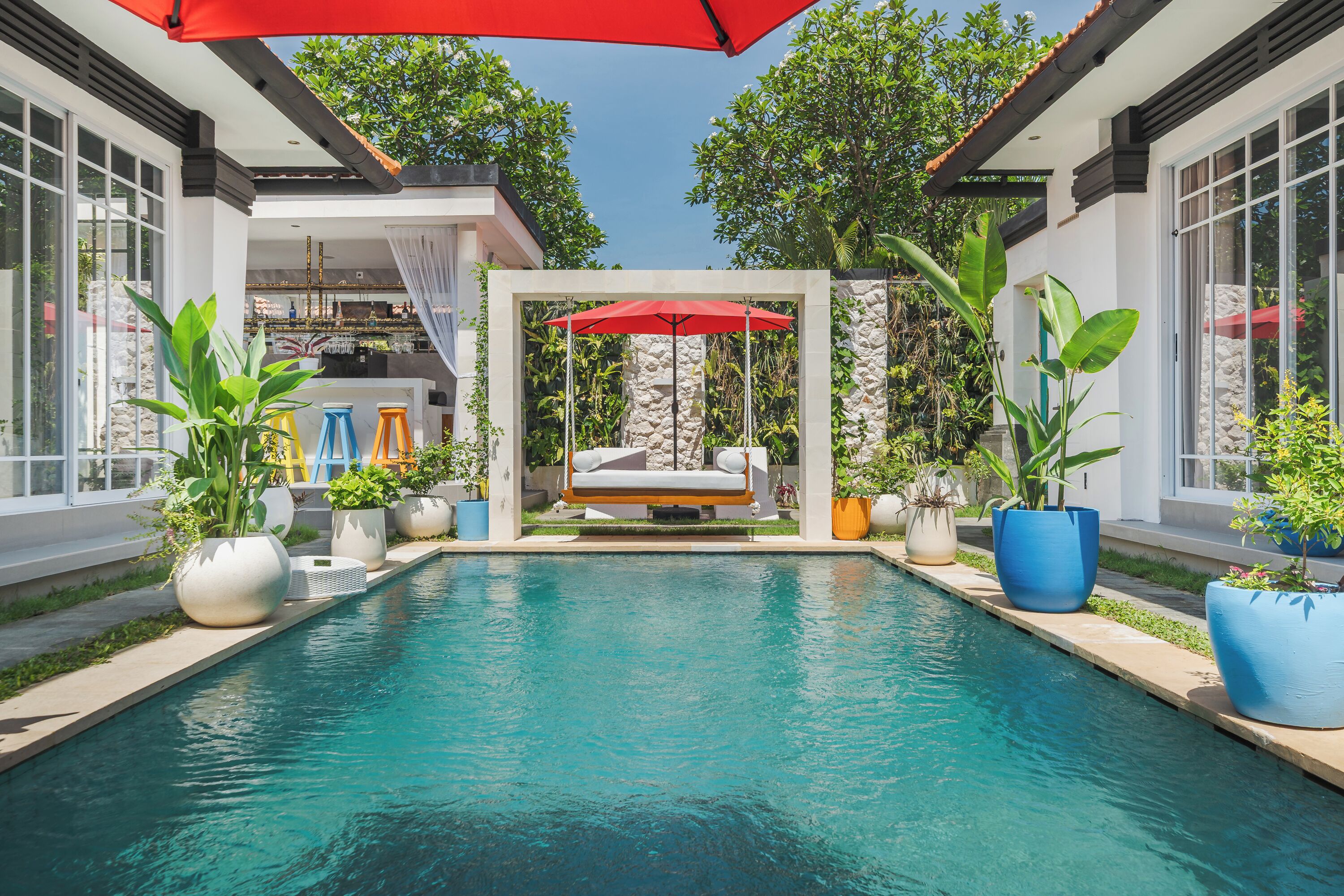 Outdoor pool, pool umbrellas, sun loungers