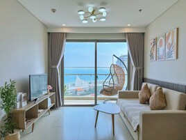 Apartment, 3 Bedrooms, Balcony, Beach View | Living area | 45-inch Smart TV with digital channels, Netflix, streaming services