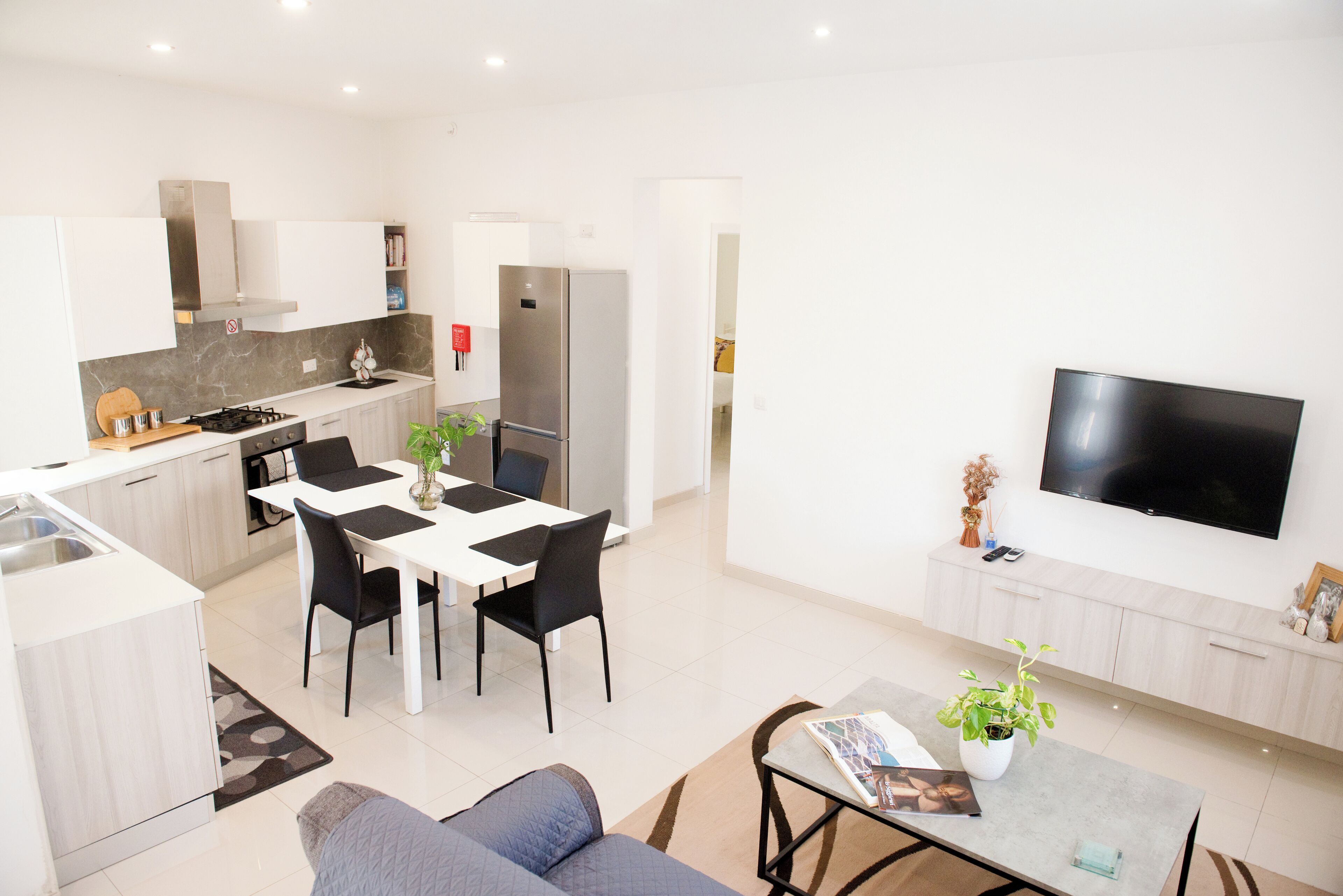 Apartamento, balcón, vistas a la ciudad | Zona de estar