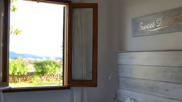 2 dormitorios, escritorio, tabla de planchar con plancha y wifi