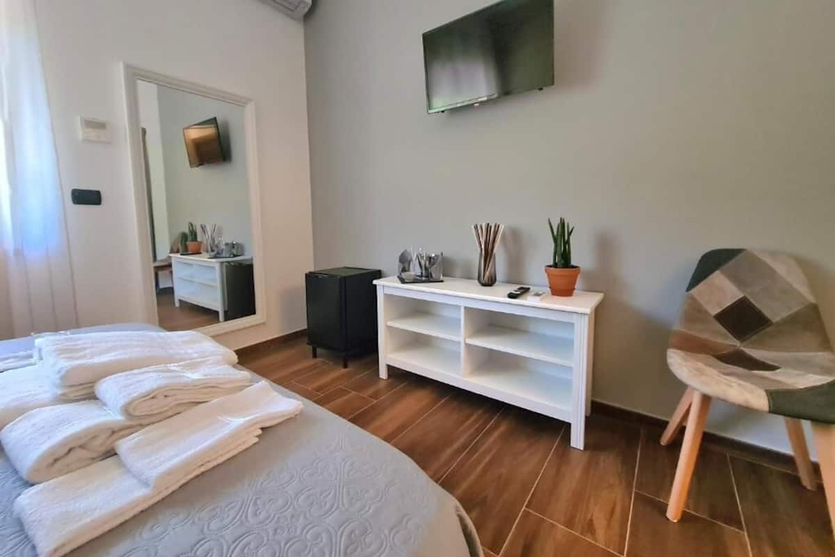 Premium bedding, down duvets, memory-foam beds, minibar