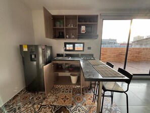 Basic Studio, City View | Private kitchen | Fridge, microwave - Coral Tower (Barranquilla)