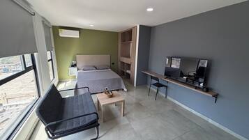 Desk, laptop workspace, free WiFi, bed sheets