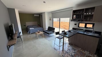 Desk, laptop workspace, free WiFi, bed sheets