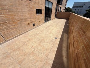 Estudio Deluxe, vistas a la ciudad | Terraza o patio