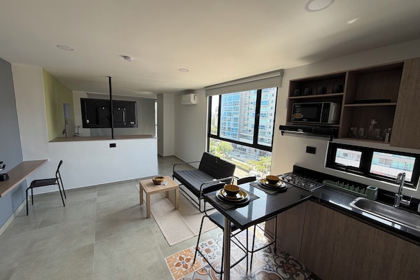 Basic Studio, City View | Living area | 32-inch Smart TV with digital channels