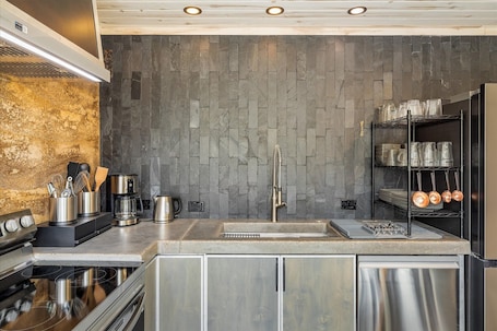 Fridge, oven, stovetop, dishwasher. Private Rammed Earth Cabin: Soaking Tub & Kitchen