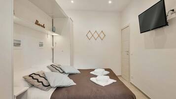 2 chambres, fer et planche à repasser