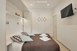 2 camere, ferro/asse da stiro