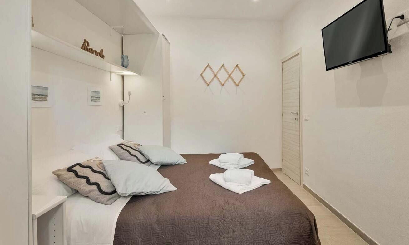 2 soverom og strykejern/-brett