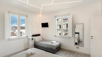 2 chambres, fer et planche à repasser, Wi-Fi, draps fournis