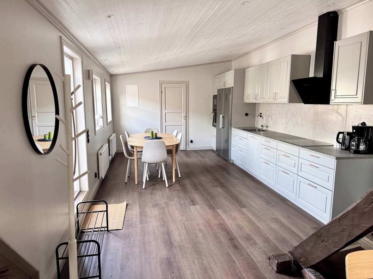 Overview of the kitchen and dining spot for up to 8 guests