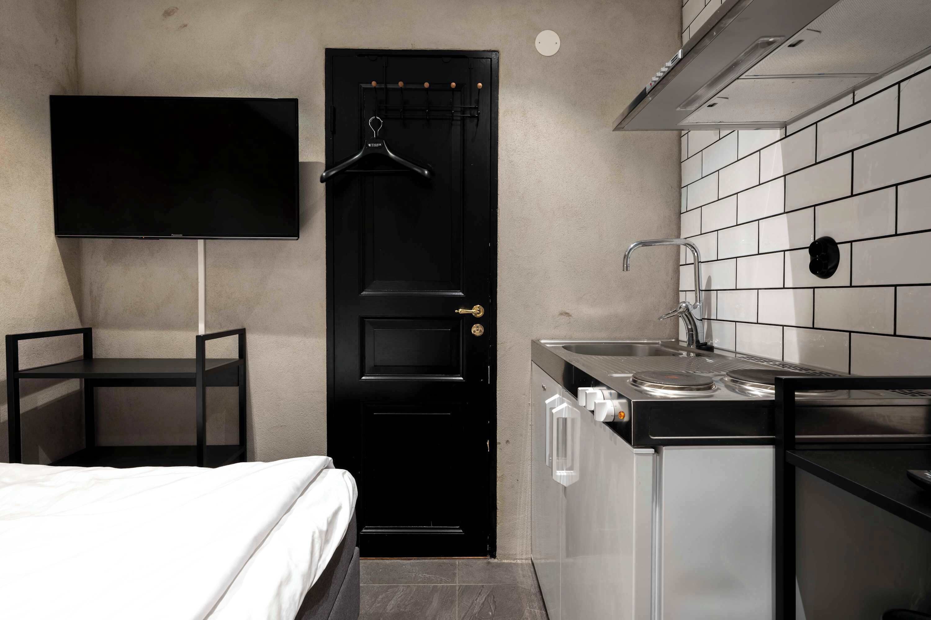 1 dormitorio, tabla de planchar con plancha, wifi y ropa de cama