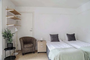 1 slaapkamer, een strijkplank/strijkijzer, wifi, beddengoed