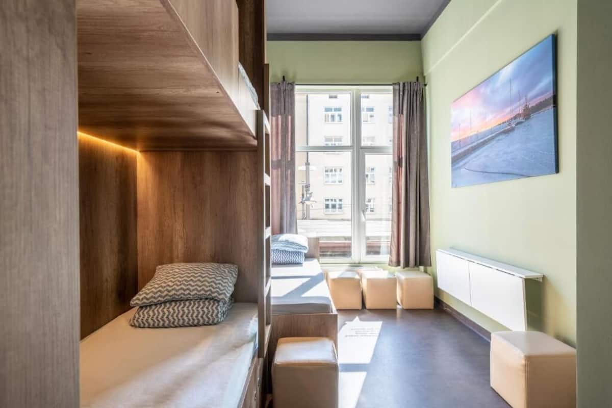 Family Room, Courtyard View | Iron/ironing board (on request), WiFi (free), bed sheets