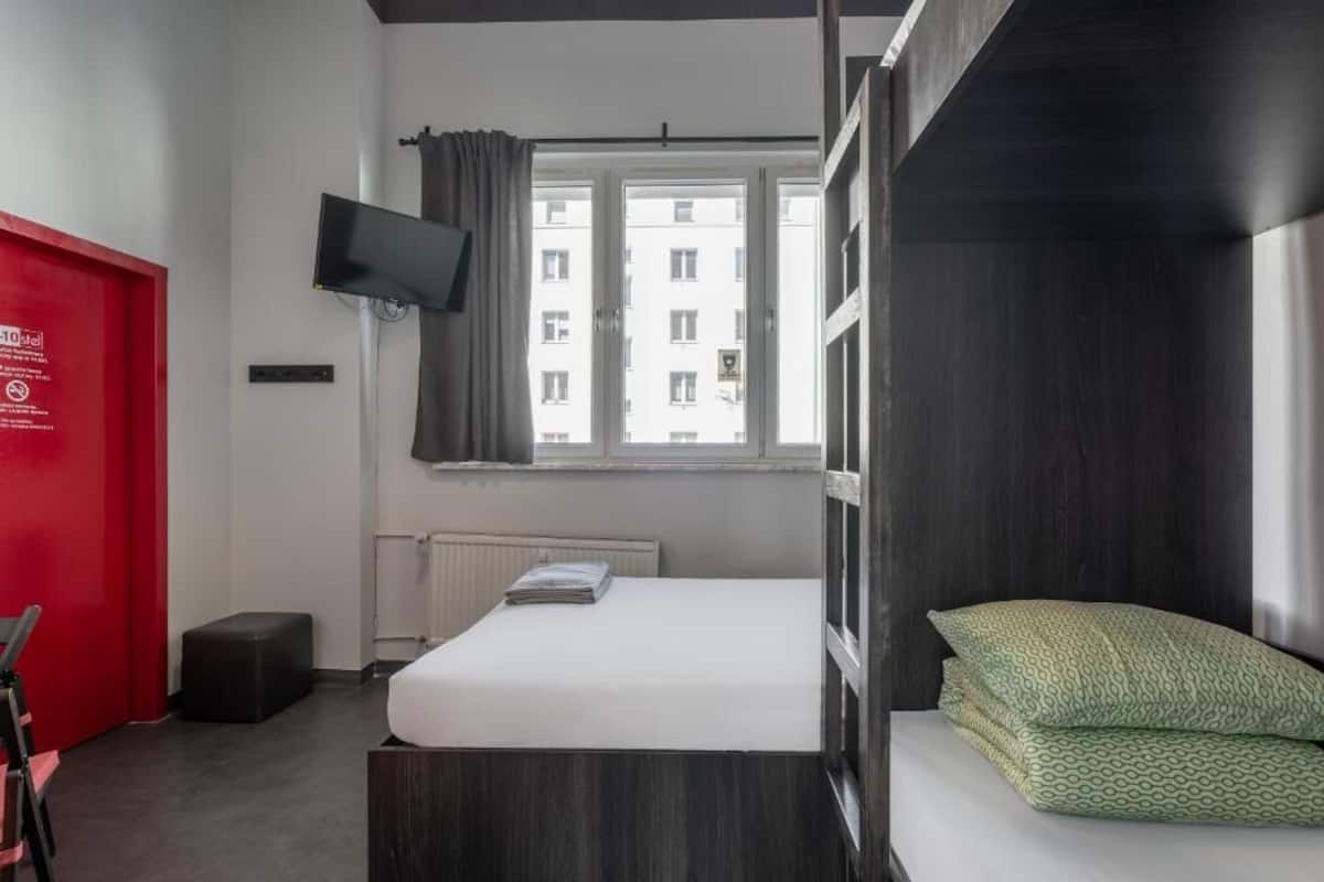 Quadruple Room, Courtyard View | Iron/ironing board (on request), WiFi (free), bed sheets