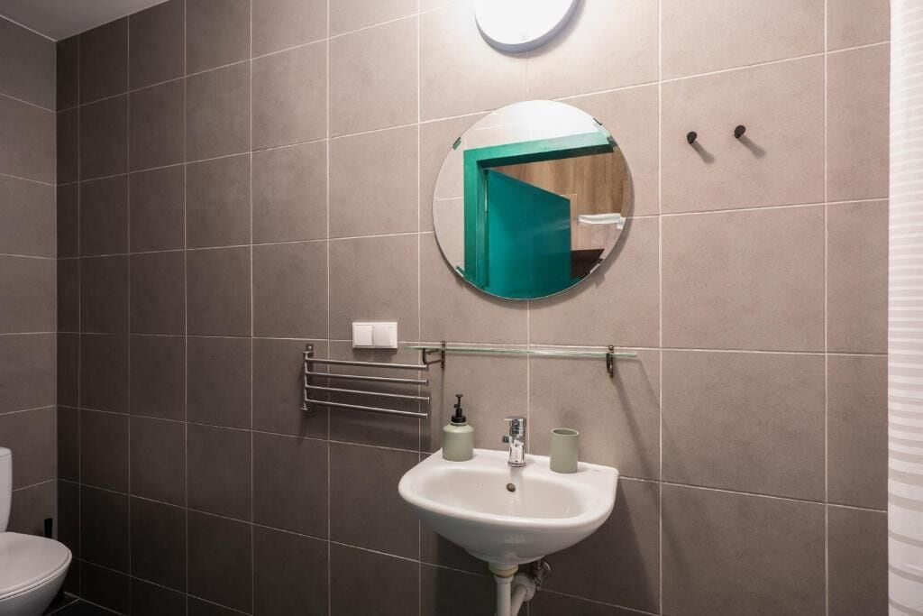Family Room | Bathroom | Shower, hair dryer, toilet paper