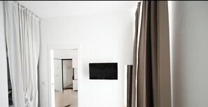 Rideaux occultants, fer et planche à repasser, Wi-Fi gratuit