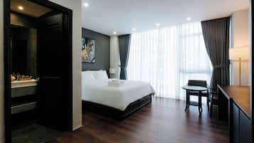 Chambre Double Deluxe pour 1 personne, vue ville | Articles gratuits dans le mini-bar, coffres-forts dans les chambres