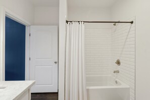 Hair dryer, towels, soap, shampoo - Cute and Cozy 2BR/2BA w/Parking, Yard, King Suite & Blocks to Local Favorites (New Orleans)