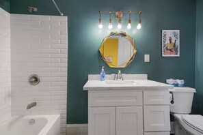 Hair dryer, towels, soap, shampoo - Cute and Cozy 2BR/2BA w/Parking, Yard, King Suite & Blocks to Local Favorites (New Orleans)
